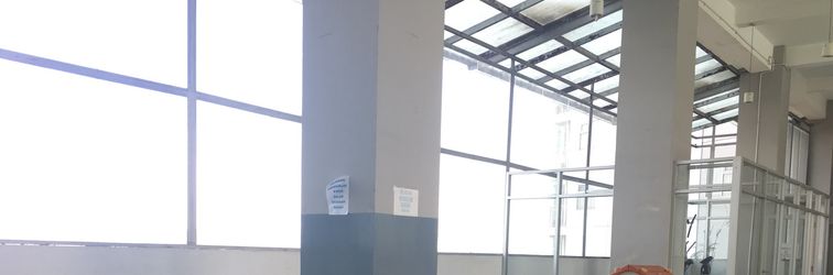 Lobby Homey Studio Room at Harvard Jatinangor Apartment By Travelio