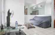 Ruang untuk Umum 3 Comfy 2BR at Apartment Gajah Mada Mediterania By Travelio
