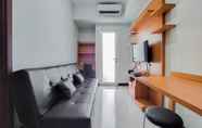 Common Space 2 Comfort and Nice 1BR Apartment at Scientia Residence By Travelio