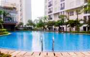 Swimming Pool 5 Comfort and Nice 1BR Apartment at Scientia Residence By Travelio