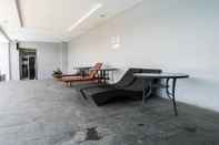 Lobby Relaxing Studio at Puri Mas Apartment By Travelio