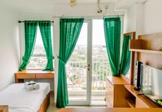 Ruang untuk Umum 2 Comfort and Cozy Studio Room at Poris 88 Apartment By Travelio