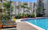 Lobi 7 Cozy and Graceful 2BR at Signature Park Grande Apartment By Travelio