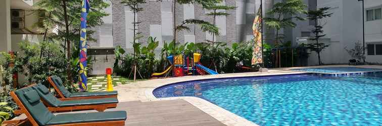 Lobi Cozy and Graceful 2BR at Signature Park Grande Apartment By Travelio