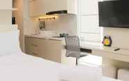 Ruang untuk Umum 2 Warm and Nice Studio at Vasanta Innopark Apartment By Travelio