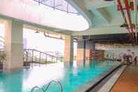 Swimming Pool Minimalist and Comfort 1BR at Atlanta Residences By Travelio