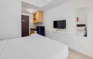 Ruang untuk Umum 2 Tidy and Modern Studio Serpong Garden Apartment By Travelio