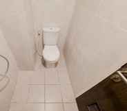 In-room Bathroom 4 Tidy and Modern Studio Serpong Garden Apartment By Travelio