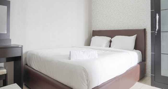 Phòng ngủ Tidy and Homey 2BR Apartment at Seasons City Latumenten By Travelio