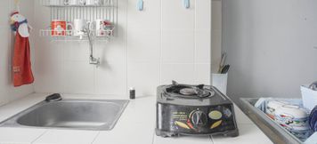 Common Space 5 Tidy and Homey 2BR Apartment at Seasons City Latumenten By Travelio