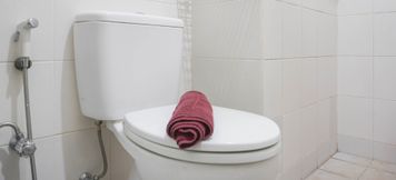 In-room Bathroom 6 Tidy and Homey 2BR Apartment at Seasons City Latumenten By Travelio