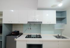 Ruang Umum 4 Restful and Warm Studio at Springlake Summarecon Apartment By Travelio