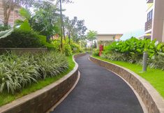 Lobi 7 Restful and Warm Studio at Springlake Summarecon Apartment By Travelio