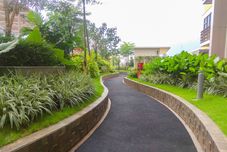 Lobi Restful and Warm Studio at Springlake Summarecon Apartment By Travelio