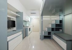 Ruang Umum 3 Restful and Warm Studio at Springlake Summarecon Apartment By Travelio