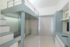 Ruang Umum Restful and Warm Studio at Springlake Summarecon Apartment By Travelio