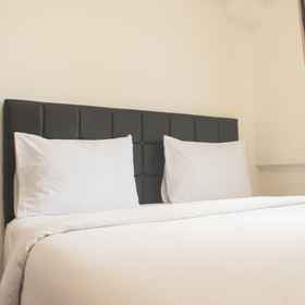 Bedroom 1 Comfort 1BR Apartment with Dining Room at Meikarta By Travelio, Sukamahi Hotels