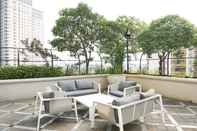 Lobi Exclusive 2BR Apartment at The Bellezza with City View By Travelio
