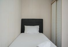Bedroom 2 Nice and Spacious 2BR at Casa De Parco Apartment By Travelio