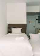 BEDROOM Warm and Cozy Studio at Urbantown Serpong Apartment By Travelio