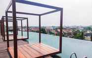 Swimming Pool 7 Cozy and Warm Studio at Grand Kamala Lagoon Apartment By Travelio