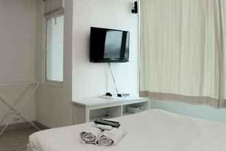 Ruang Umum 4 Cozy and Warm Studio at Grand Kamala Lagoon Apartment By Travelio