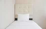 Bedroom 2 Combine 2BR Apartment at Cinere Bellevue Suites By Travelio