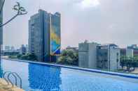 Swimming Pool Brand New 2BR at The Kencana Residence Apartment By Travelio