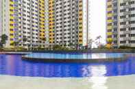 Swimming Pool Comfortable 2BR Apartment at Springlake Summarecon Bekasi By Travelio