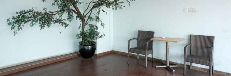 Lobby Cozy Living Studio at Belmont Residence Apartment near Puri By Travelio