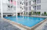 Swimming Pool 7 Modern Minimalist Studio Room Apartment at Taman Melati By Travelio