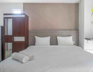 Kamar Tidur 2 Modern Minimalist Studio Room Apartment at Taman Melati By Travelio