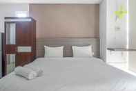 Bedroom Modern Minimalist Studio Room Apartment at Taman Melati By Travelio