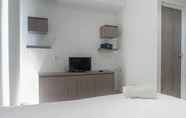 Common Space 2 Modern Minimalist Studio Room Apartment at Taman Melati By Travelio