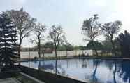 Swimming Pool 7 Spacious 1BR at Apartment The Edge Cimahi Bandung By Travelio