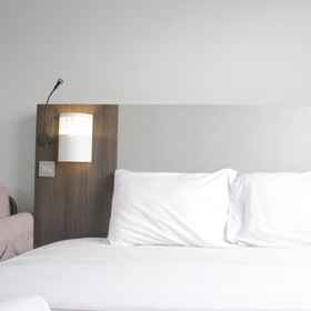 Bedroom 1 Relaxing and Bright Studio at The Edge Cimahi Apartment By Travelio, Cipeundeuy Hotels