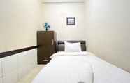 Bedroom 2 Comfortable 2BR at Apartment The Edge Cimahi By Travelio