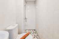 In-room Bathroom Fully Furnished 1BR Apartment with Study Room at Serpong Garden By Travelio