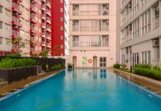 Kolam Renang 6 Cozy Stay Studio at Taman Melati Margonda Apartment By Travelio
