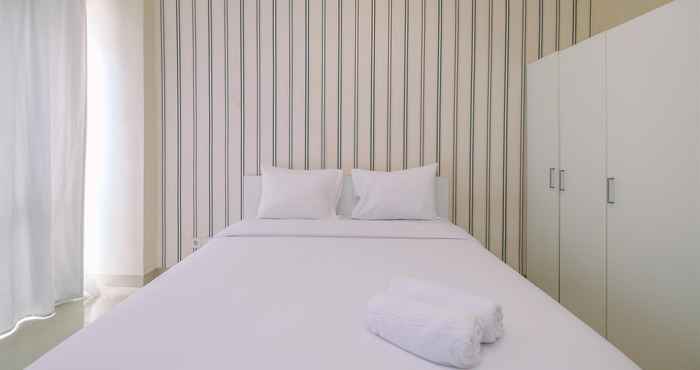 Bedroom Cozy Stay Studio at Taman Melati Margonda Apartment By Travelio