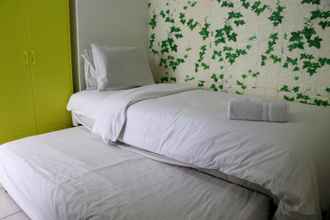 Bedroom 4 Cozy Stay 2BR at Akasa Pure Living BSD Apartment By Travelio