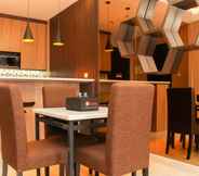 Common Space 4 Comfy 2BR + Study Room at Sudirman Suites Apartment By Travelio Premium