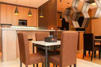 Common Space 4 Comfy 2BR + Study Room at Sudirman Suites Apartment By Travelio Premium