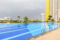 Swimming Pool Fully Furnished Studio Apartment at Springlake Summarecon By Travelio