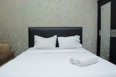 Bedroom Minimalist Studio Room Apartment at Kebagusan City By Travelio