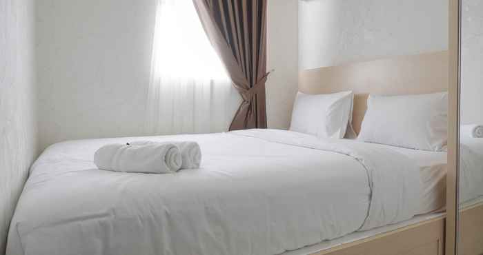 Phòng ngủ Warm and Comfort 2BR at Parkland Avenue Apartment By Travelio