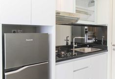 Common Space 4 Fancy and Nice Studio Apartment at Springlake Summarecon Bekasi By Travelio