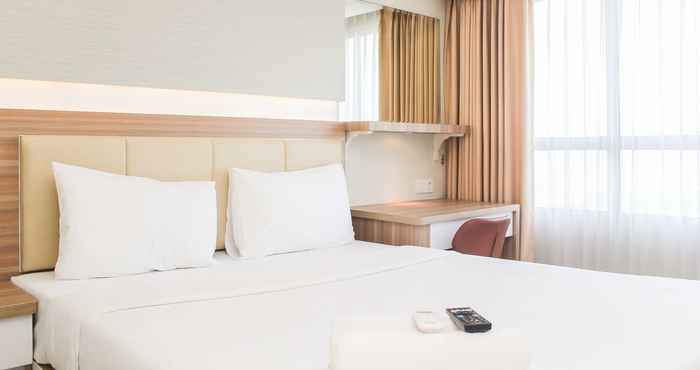 Kamar Tidur Fancy and Nice Studio Apartment at Springlake Summarecon Bekasi By Travelio