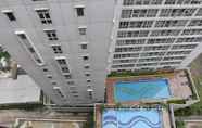 Swimming Pool 6 Tidy and Homey Studio Taman Melati Margonda Apartment near Campus By Travelio