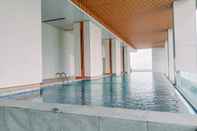 Swimming Pool Comfort and Elegant 1BR at The Smith Alam Sutera Apartment By Travelio